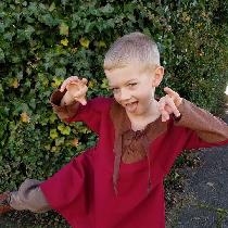 James, A red and brown boys tunic. 