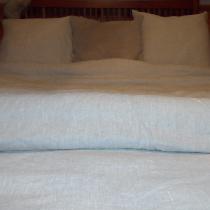 Using 9 yards of 4C22 fabric in mix natural, I made a queen size duvet cover and matching euro s...