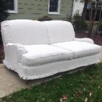 Christy, Sofa slipcover with baby knife pleats.