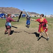 Shannon, Red and gold tunic on the right. Pattern...