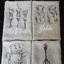 Personalized linen tea towels. My friend buys my towels to include in her thank you gift baskets...