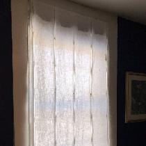 "Pouf" Window Shade is relaxed when down filtering the room with a linen white glow! M...