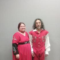 these are a woman's dress and a man's 16 th century  spanish outfit. both are made from red line...