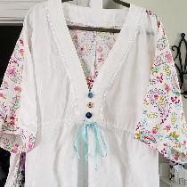 Drawstring tunic top. Signature finish linen with cotton print for back yoke and sleeves.