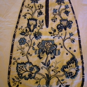 Hanging pocket of linen with wool embroidery work.  The wool's colors are all naturally indigo d...