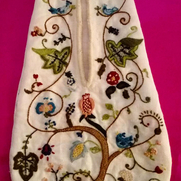 This is a 17th century ladies pocket. I created the design and used wool threads to embroider a...