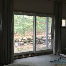 Blackout curtains hanging from a 10 foot ceiling curtain track; lightweight enough to be lined i...