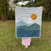 Mercy, Hand quilted baby quilt with a Mountain...