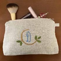 Personalized linen cosmetic bag.  This linen is a dream to machine embroider and makes great bag...