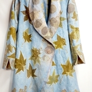 Hand dyed and ecoprinted heavy linen. Cut and sewn into an unlined coat, with a shawl collar and...