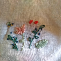 Hand embroidered for my toddler's overalls on bleached linen.