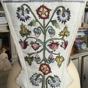 I have hand embroidered this stomacher in hand dyed silk floss, the Frazer Strawberry motif to w...