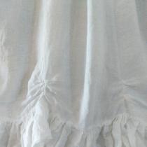 Petticoat skirt, elastic waist and ruching around hem.
Made.with lightweight linen which crushes...