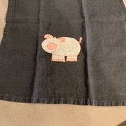 I did a pig on grey linen. First attempt at applique. It was fun.