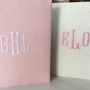 Hello,
We make custom made monogrammed baby and wedding books with Fabrics-Stores beautiful line...