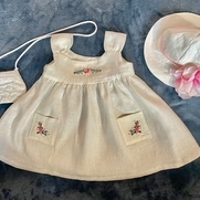 Toddler size 2 dress with machine embroidery. The zippered purse is made “in the hoop” using an...