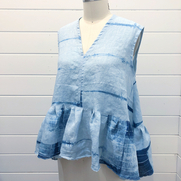 Over the summer I made an indigo vat and used the shibori folding technique to dye 10 yards of l...