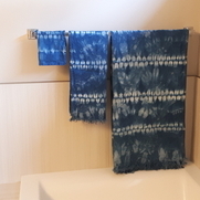 My first time trying indigo Shibori dyeing, decided to dye a towel set, kind of love how they tu...