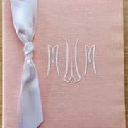 We monogram baby books and light pink and light blue are, of course, the most popular.  We are s...