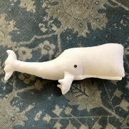 Kimberly, 20” long plush whale detailed with butto...