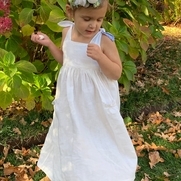 This is my granddaughter June bug, she feels like a princess twirling in her bleached linen dres...