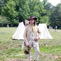 A matching waistcoat and trouser combo of 9oz blue checked linen, as described in descriptions o...