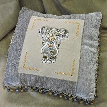 Hand embroidered elephant on linen for a cushion cover.