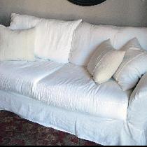 Hollie, I made a crisp, white sofa cover out of...