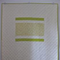 Brigit, This crib or lap quilt uses handkerchief...