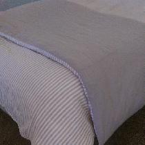 Winter duvet cover for an organic wool stuffed duvet!  The linen used is ivory and natural strip...
