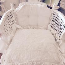 Linen vintage chair with fat white linen ruffled pillow 