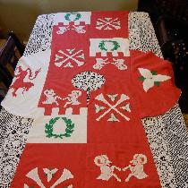 This is a heraldic tabard completed in red, white, and green mid-weight linen.  The appliques ha...