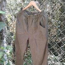 Trousers in pure olive linen.