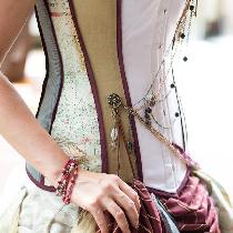 Custom designed and fabricated wedding corset and skirt created with linen, silk, and cotton fab...