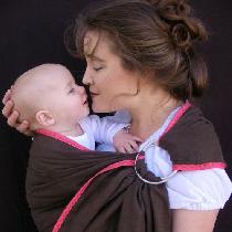 We love linen for baby slings - strong, natural, breathable. Edged with bias tape, this sling ac...