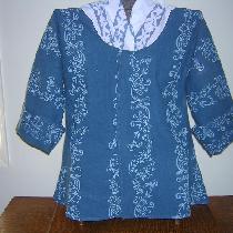 A pretty shade of blue linen was hand printed in a white pattern and sewn into an 18th century s...