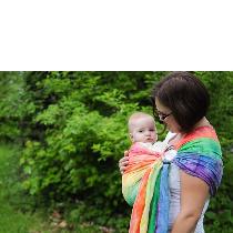 This is a ring sling. I took white linen and tie dyed it. It helps parents keep their child clos...