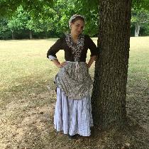 Revolutionary War Woman on the Ration - Striped linen petticoats, Checked linen apron, and white...
