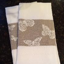 Ronda, Linen tea towels with hand-stamped butte...