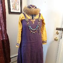 I am a member of the SCA and this is my Viking apron dress and underdress. It has hand finished...