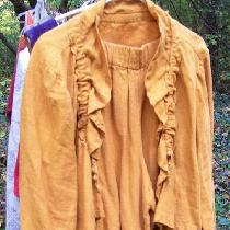This is a crop jacket and pantaloons made from the color autumn gold and a dress made with the r...