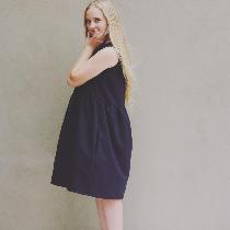 I made an oversized swing dress with 100% black linen. I made up the pattern myself, customizing...