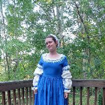 This is a recreation of a 17th century gown. The blue is the aquamarine linen heavy weight and t...