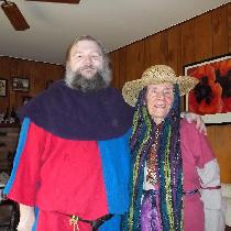 Two 11th century tunics, done in parti-colored linen, for an SCA event; worn by my mother and I....