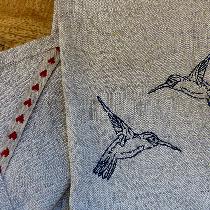 Embroidered tea towels using mix natural linen.