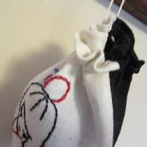 I love the Black softened 4C22 Linen and used it for one side of the bag.  I embroidered on the...