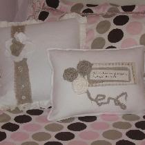 Jeanne, Pillows w/trim and rosettes in white and...