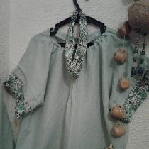 Summer blouse in frosty green and flowers in cotton.
