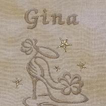 IL019 linen in softened, Optic White was used to make personalized shoe bags, destined to be a b...