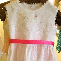 This dress is handmade in handkerchief linen. It has been finely hand embroidered with flowers i...